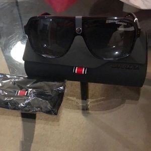 One pair of carrera UV protection sunglasses.